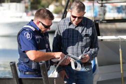 ranger checking a licence