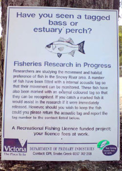 Photo of a public information sign providing information about tagged fish