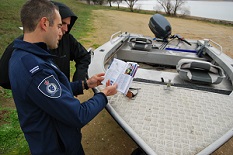 boat and officer